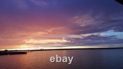 Backyard Photo a Bird almost on piling across the Bay from Long Beach Island NJ