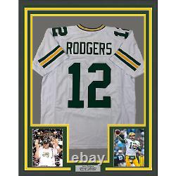 Framed Facsimile Autographed Aaron Rodgers 33x42 Green Bay White Laser Jersey