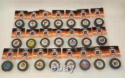 Lot of 22 vintage NHL hockey pucks Trench unopened orig pkg 22 different teams