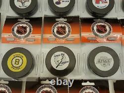 Lot of 22 vintage NHL hockey pucks Trench unopened orig pkg 22 different teams