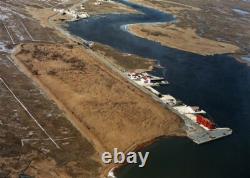 Photograph Bird Landing on piling across the Bay from Long Beach Island NJ